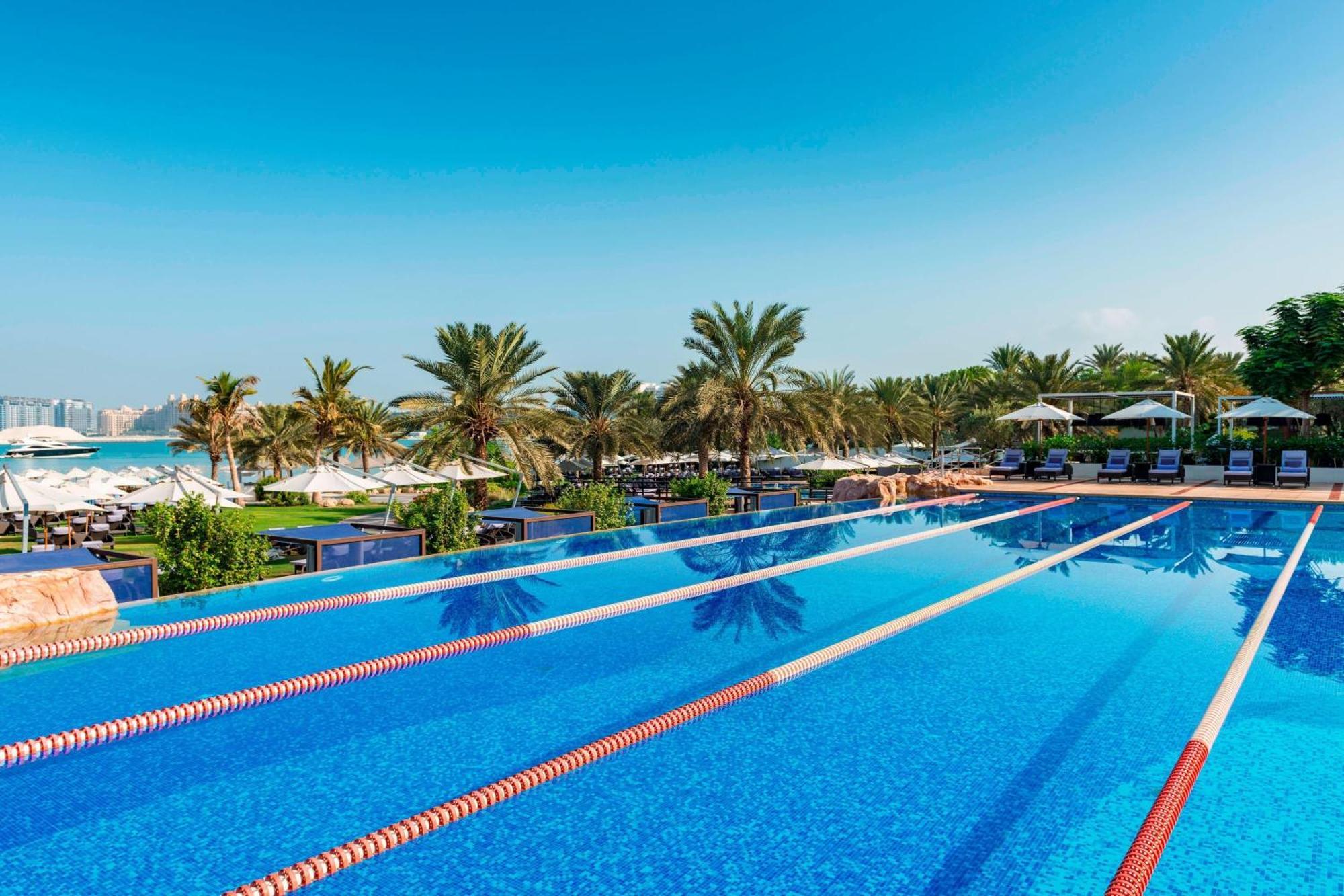 The Westin Dubai Mina Seyahi Beach Resort And Waterpark Exterior photo The swimming pool at Jumeirah Beach Hotel
