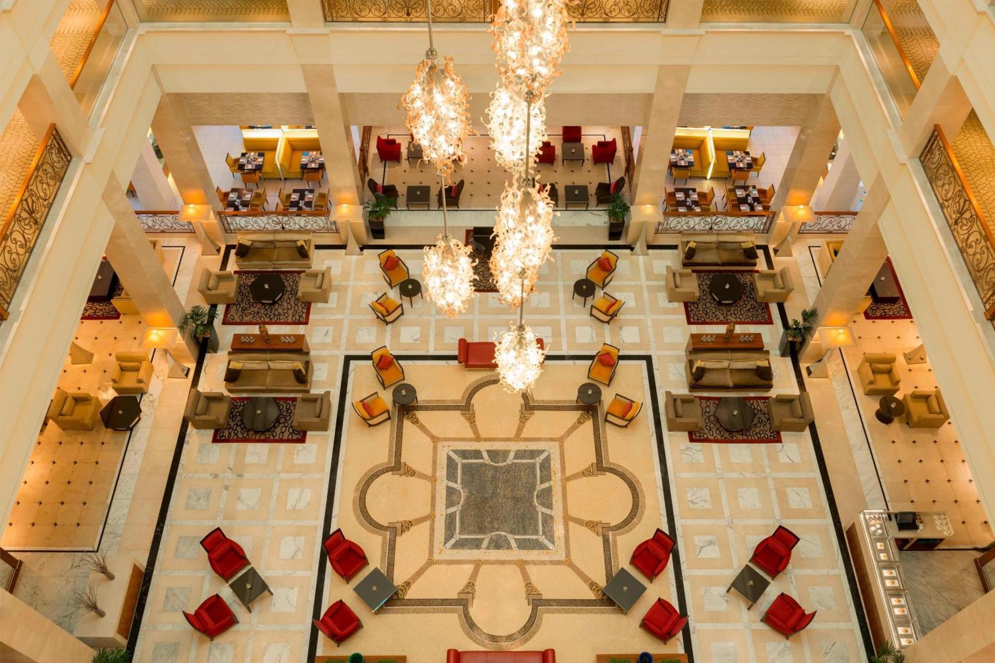 The Westin Dubai Mina Seyahi Beach Resort And Waterpark Exterior photo The lobby of the Taj Mahal Palace