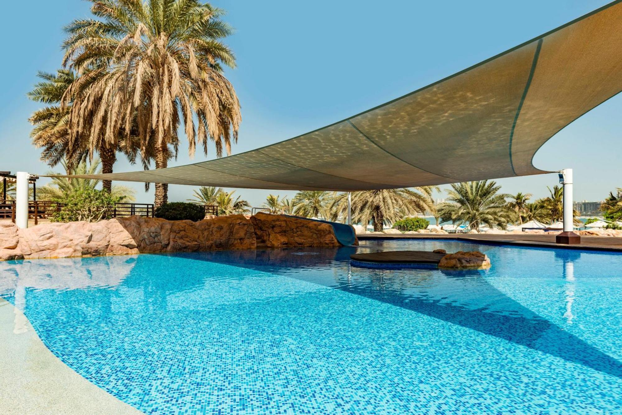 The Westin Dubai Mina Seyahi Beach Resort And Waterpark Exterior photo The swimming pool at the resort